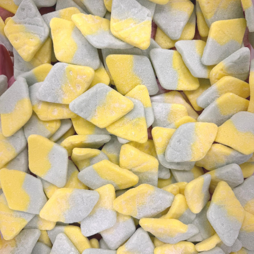 Close-up of candy corn with yellow and gray colors.