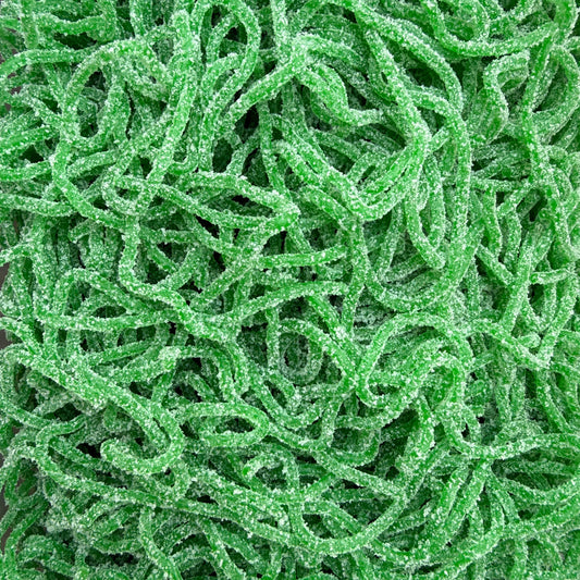 A close-up of bright green, sugar-coated, curly candy sticks filling the entire frame.